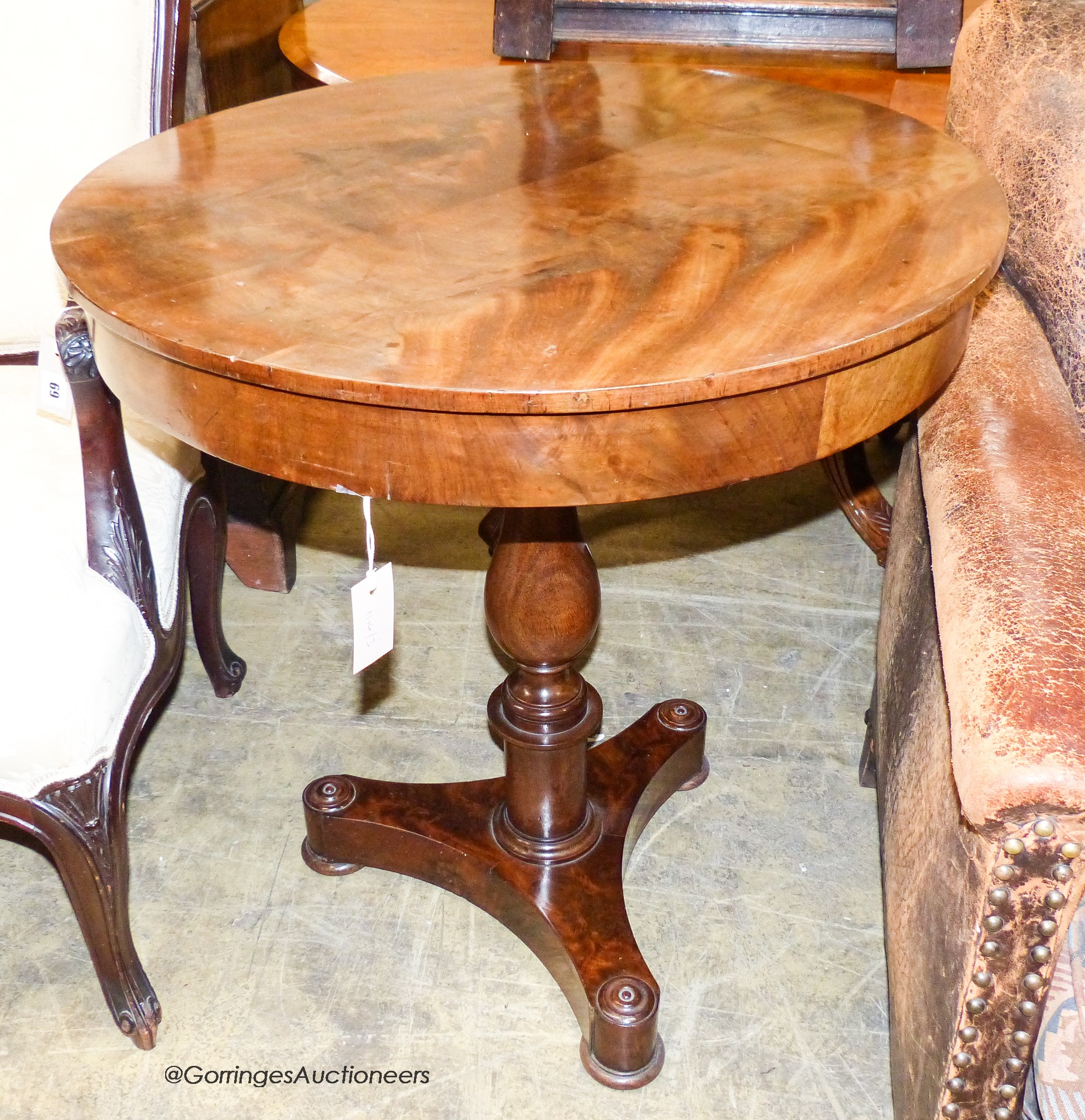 A Victorian mahogany circular mahogany centre table, diameter 70cm, height 76cm